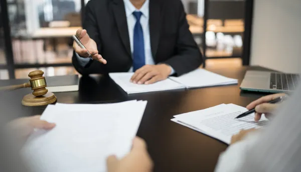 legal-counsel-presents-to-the-client-a-signed-cont-2026-01-07-01-03-55-utc-6998741d1fde6